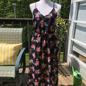 Sienna Sky size S high-low maxi dress. Dark navy floral chiffon.